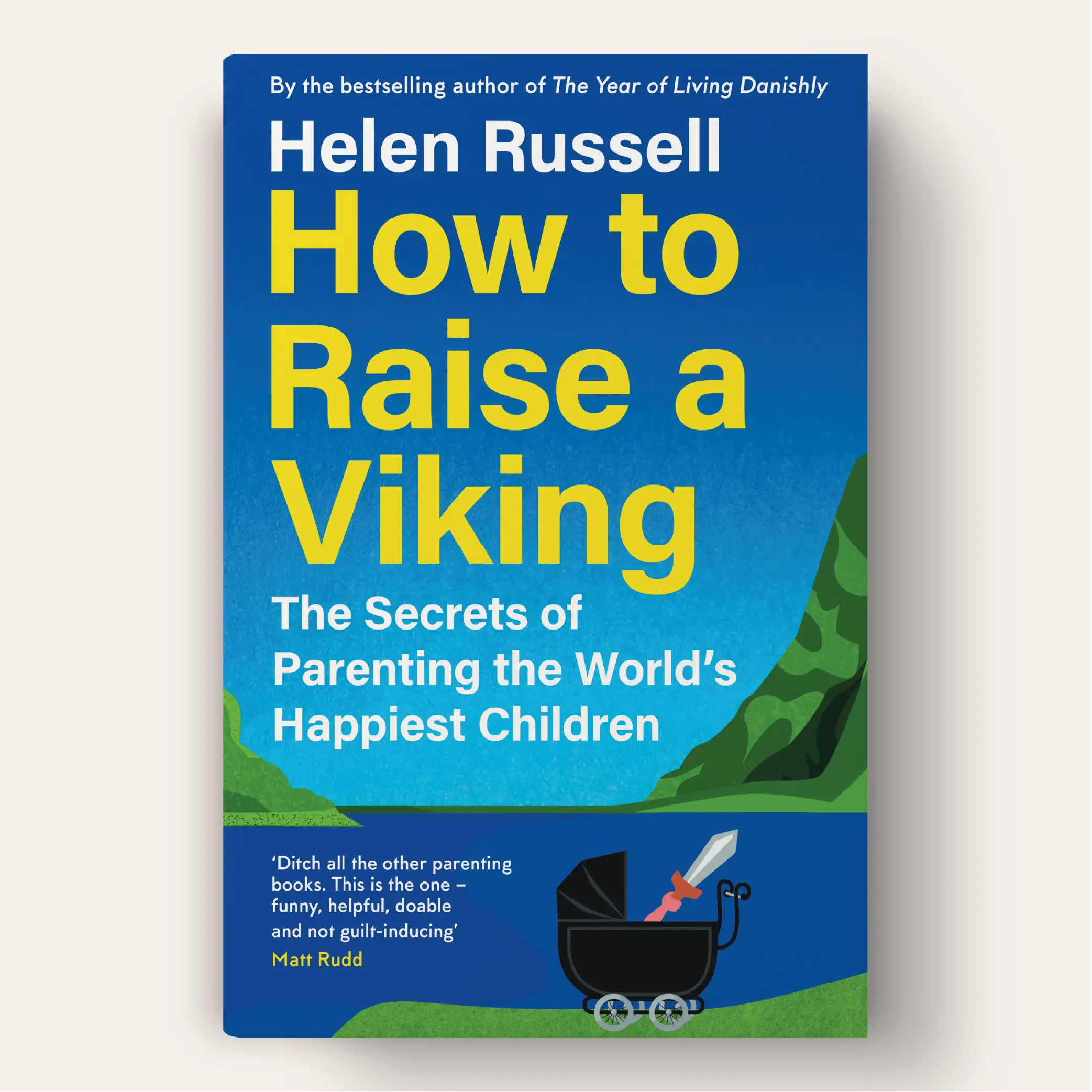 A bright yellow and blue book cover showing a black stroller with a Viking helmet and sword inside. The title, 'How to Raise a Viking,' is in large, bold yellow text, and the subtitle, 'The Secrets of Parenting the World's Happiest Children,' is written in white beneath it.