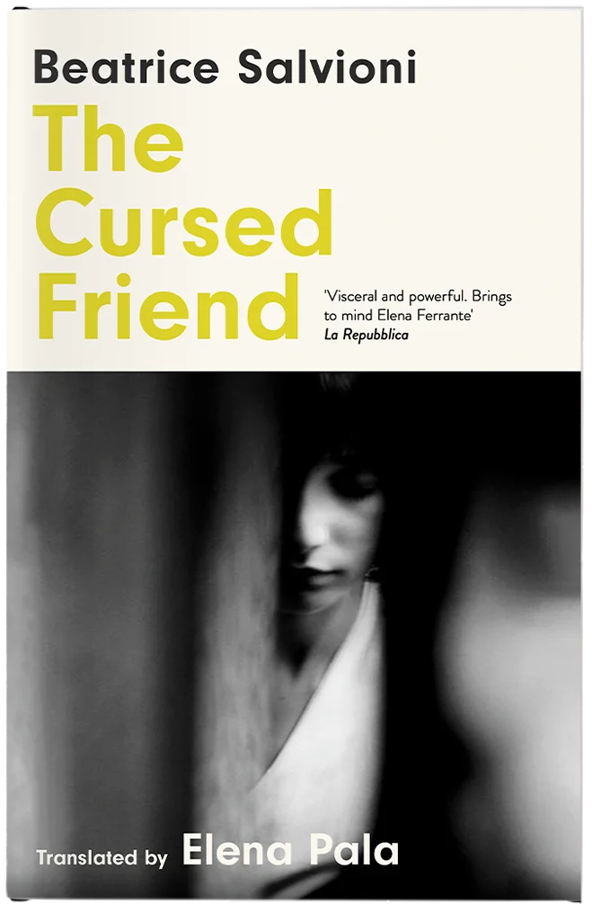 A dark grey book cover showing a photo of a woman behind a curtain. The title 'The Cursed Friend' is in yellow text in the style of a vintage classics book.