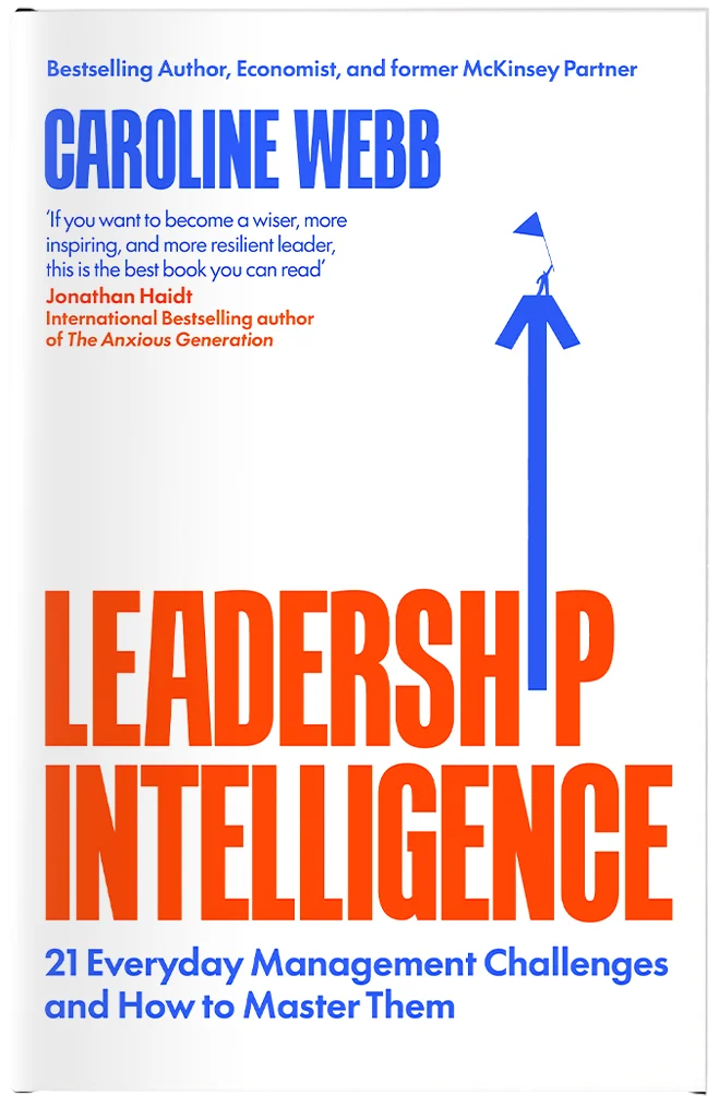 A business book with an arrow for the 'I' in leadership and a figure on top of the arrow.